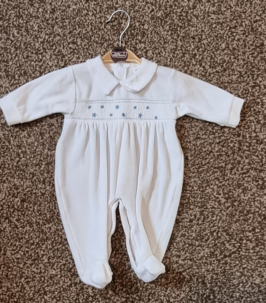White baby grow with blue star detail