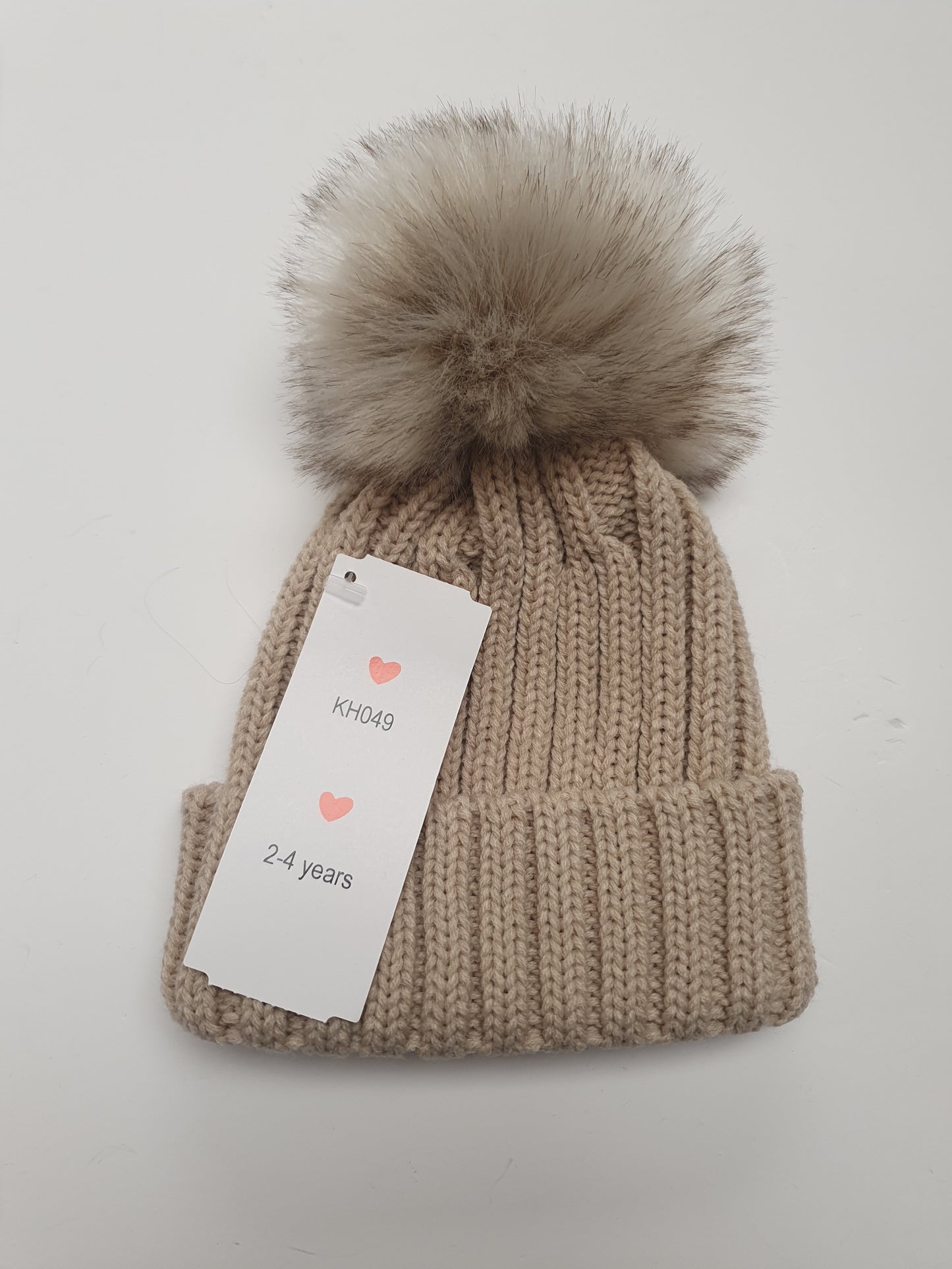 Fur pom pom hat